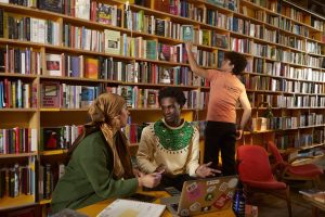 Two young people are deep in discussion